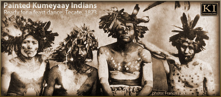 KUMEYAAY HISTORICAL RESEARCH ARCHIVES: Four Tiipay Iipai California Indian indigenous men wearing 19th century aboriginal feather headdresses and full-body painting covering chests, faces, legs and arms. 