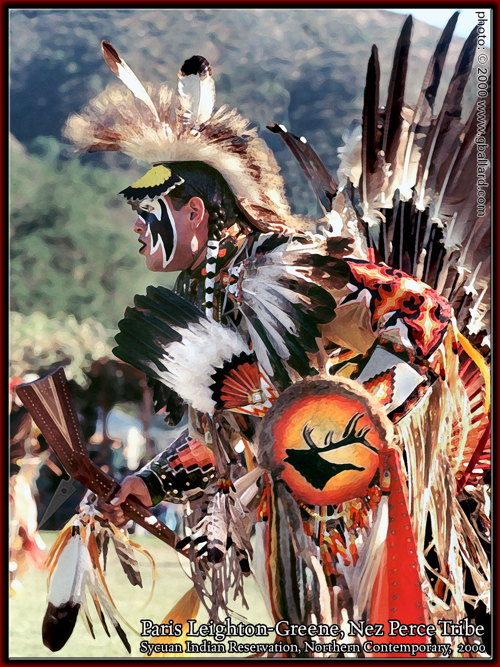 NEZ PERCE WARRIOR DANCING IN FULL TRIBAL REGALIA