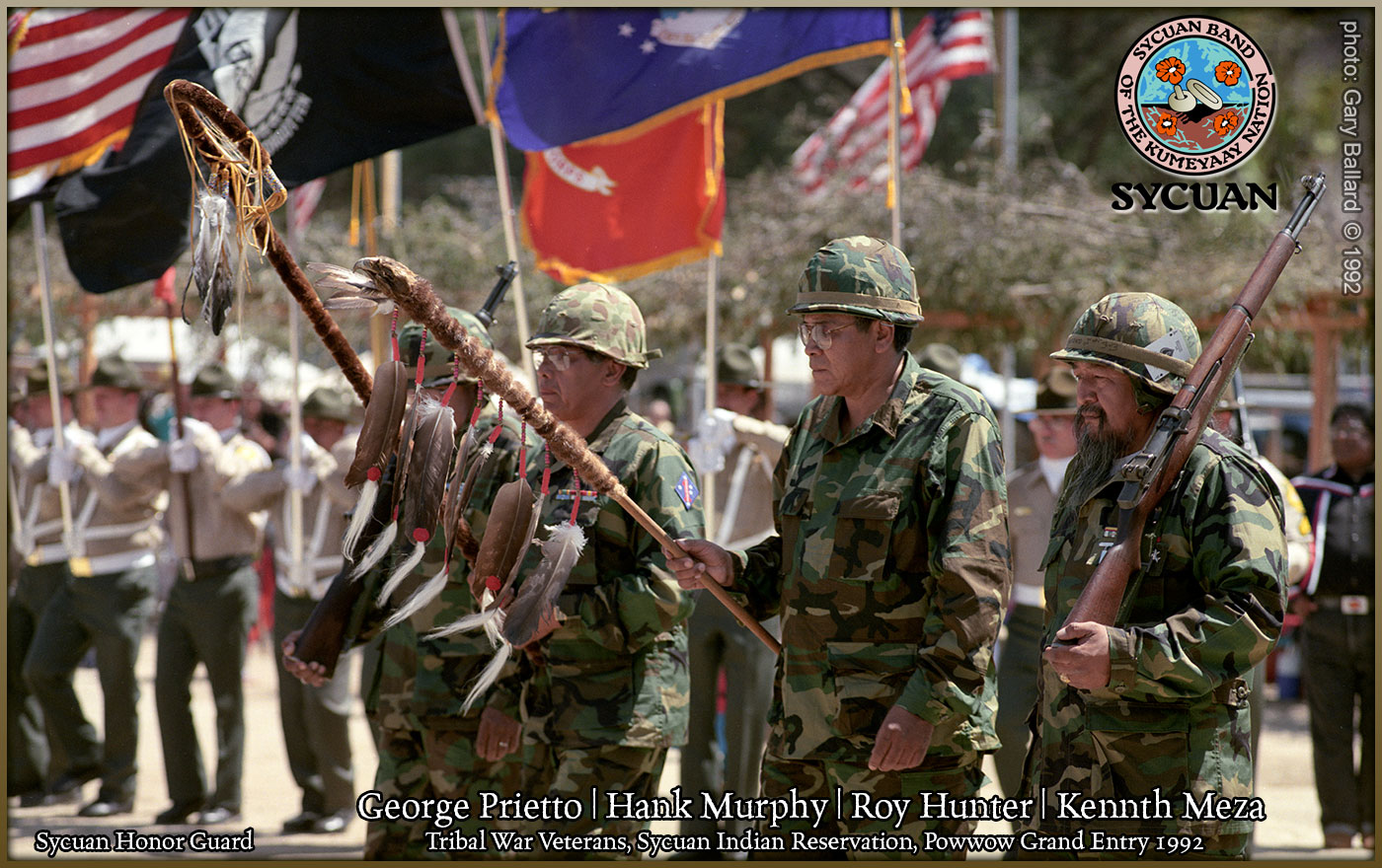 NATIVE AMERICAN INDIANS IN MILITARY UNIFORMS POST THE COLORS ON SYCUAN INDIAN RESERVATION