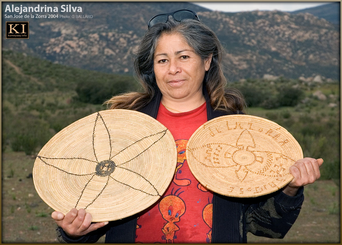 TRIBAL BASKET ARTIST DISPLAYING INDIAN BASKETS